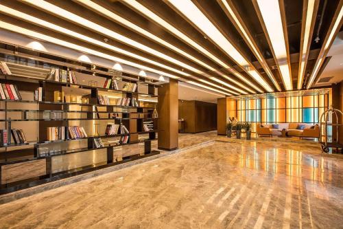 Imagen general del Hotel Mehood Dalian Hi-tech Wanda Plaza Xinghai. Foto 12