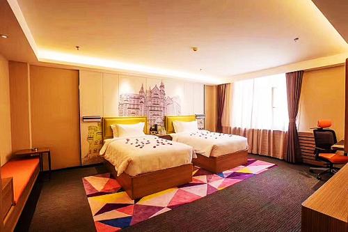 Imagen de la habitación del Hotel Mehood Dalian Hi-tech Wanda Plaza Xinghai. Foto 15