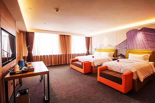 Imagen de la habitación del Hotel Mehood Dalian Hi-tech Wanda Plaza Xinghai. Foto 16