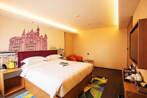 Imagen general del Hotel Mehood Dalian Hi-tech Wanda Plaza Xinghai. Foto 14