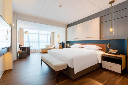 Imagen de la habitación del Hotel Mehood Elegant Guangzhou Baiyun Airport Huadu Cultural Tourism City. Foto 15