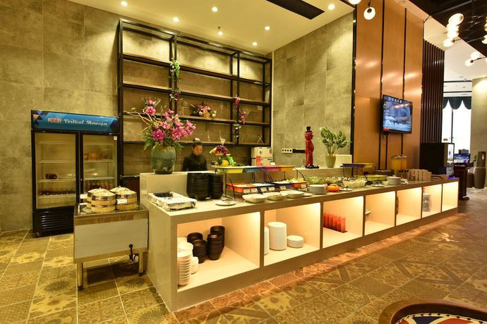 Imagen del bar/restaurante del Hotel Mehood, Foshan. Foto 2