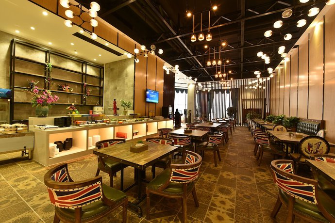 Imagen del bar/restaurante del Hotel Mehood, Foshan. Foto 3
