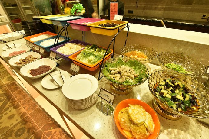 Imagen del bar/restaurante del Hotel Mehood, Foshan. Foto 5