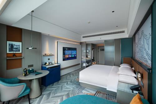 Imagen general del Hotel Mehood Guangzhou Pazhou Convention and Exhibition Center. Foto 8