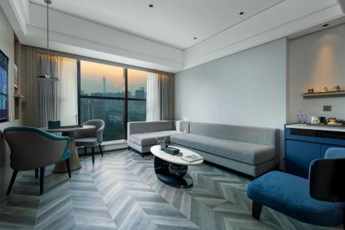 Imagen de la habitación del Hotel Mehood Guangzhou Pazhou Convention and Exhibition Center. Foto 19