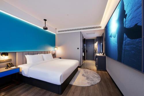 Imagen de la habitación del Hotel Mehood Hanzhong Central Plaza. Foto 14