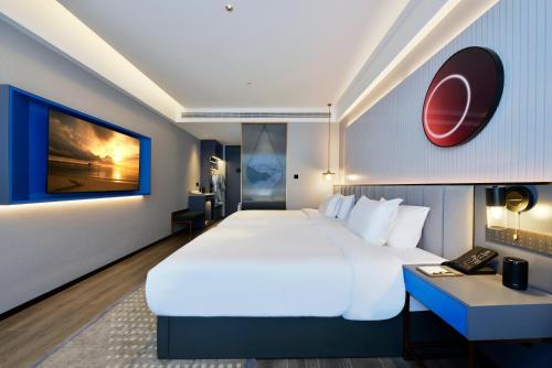 Imagen de la habitación del Hotel Mehood Hanzhong Central Plaza. Foto 18