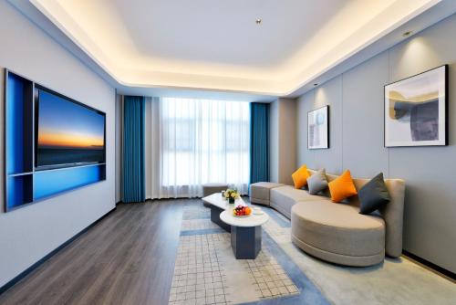 Imagen de la habitación del Hotel Mehood Hanzhong Central Plaza. Foto 19