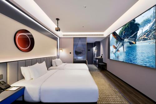 Imagen general del Hotel Mehood Hanzhong Central Plaza. Foto 11