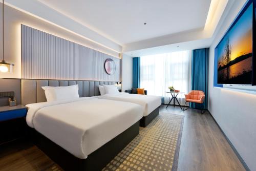 Imagen general del Hotel Mehood Hanzhong Central Plaza. Foto 12