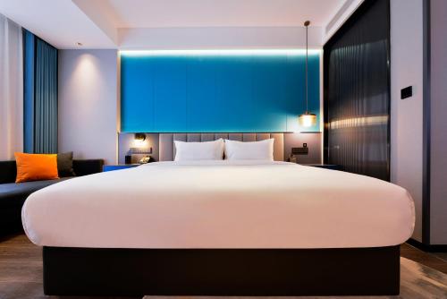 Imagen general del Hotel Mehood Hanzhong Central Plaza. Foto 13