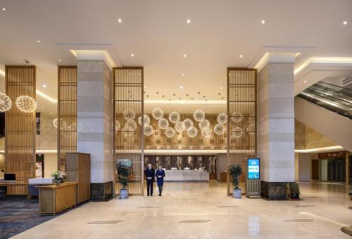 Imagen general del Hotel Mehood Lestie Guangzhou Hanxi Changlong Branch - Free Shuttle Bus to Canton Fair Complex Durin. Foto 3