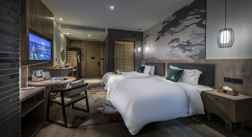 Imagen de la habitación del Hotel Mehood Lestie Hotel (Shanghai Jiading New Town). Foto 11