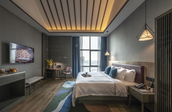 Imagen de la habitación del Hotel Mehood Lestie Hotel (Shanghai Jiading New Town). Foto 13