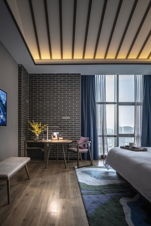 Imagen de la habitación del Hotel Mehood Lestie Hotel (Shanghai Jiading New Town). Foto 14