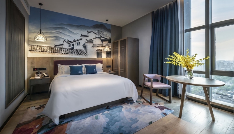 Imagen de la habitación del Hotel Mehood Lestie Hotel (Shanghai Jiading New Town). Foto 16