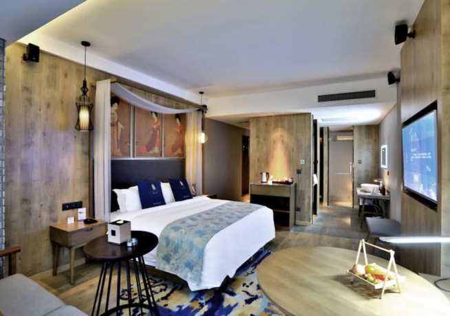 Imagen de la habitación del Hotel Mehood Lestie Hotel Wuxi. Foto 2