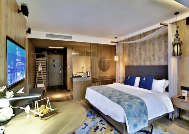 Imagen de la habitación del Hotel Mehood Lestie Hotel Wuxi. Foto 6