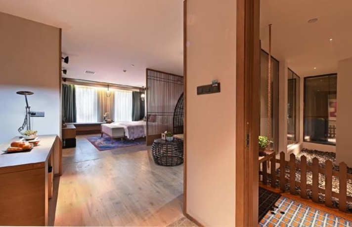 Imagen de la habitación del Hotel Mehood Lestie Hotel Wuxi. Foto 9