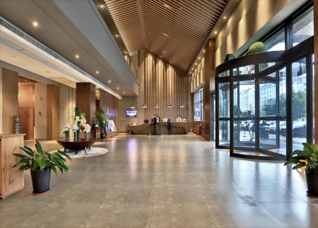 Imagen de los interiores del Hotel Mehood Lestie Hotel Wuxi. Foto 18