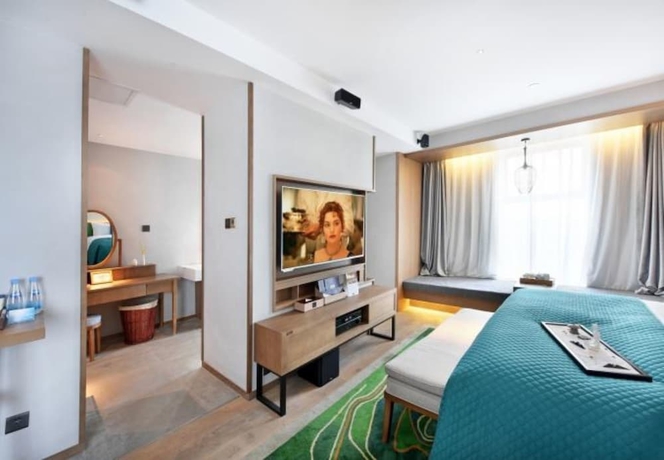 Imagen de la habitación del Hotel Mehood Lestie Hotel Wuxi. Foto 13