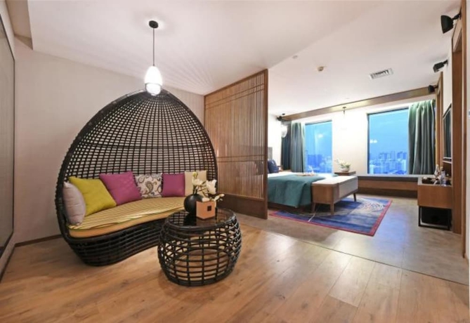 Imagen de la habitación del Hotel Mehood Lestie Hotel Wuxi. Foto 14