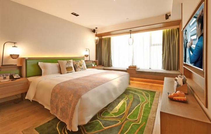 Imagen de la habitación del Hotel Mehood Lestie Hotel Wuxi. Foto 15