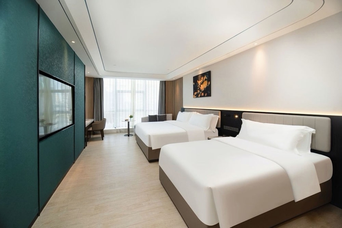 Imagen de la habitación del Hotel Mehood Lestie International Hainan. Foto 2