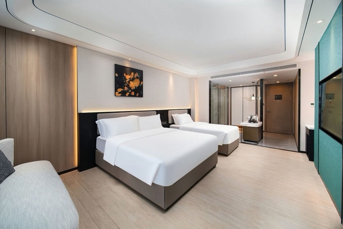 Imagen de la habitación del Hotel Mehood Lestie International Hainan. Foto 3