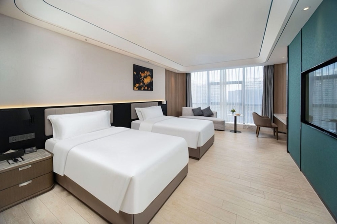 Imagen de la habitación del Hotel Mehood Lestie International Hainan. Foto 6