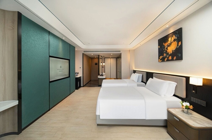 Imagen de la habitación del Hotel Mehood Lestie International Hainan. Foto 8