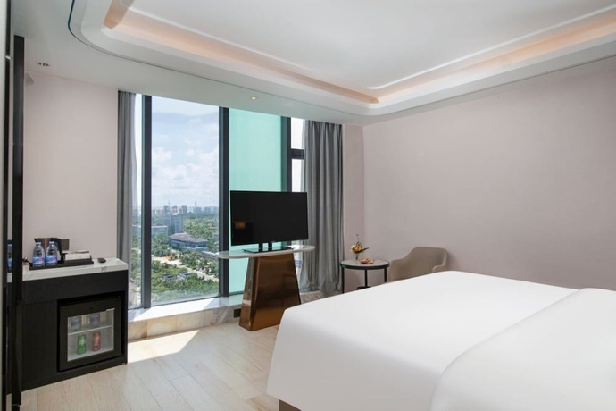 Imagen de la habitación del Hotel Mehood Lestie International Hainan. Foto 12