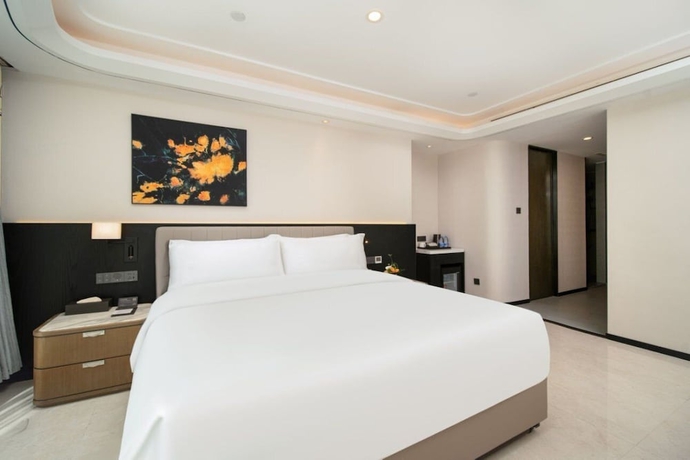 Imagen de la habitación del Hotel Mehood Lestie International Hainan. Foto 13