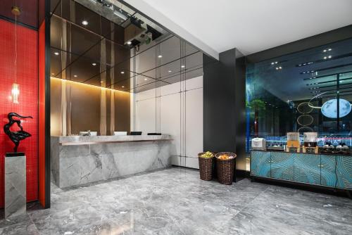 Imagen general del Hotel Mehood Lestie Maoming High-speed Railway. Foto 5