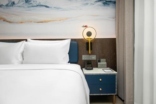 Imagen general del Hotel Mehood Lestie Maoming High-speed Railway. Foto 8