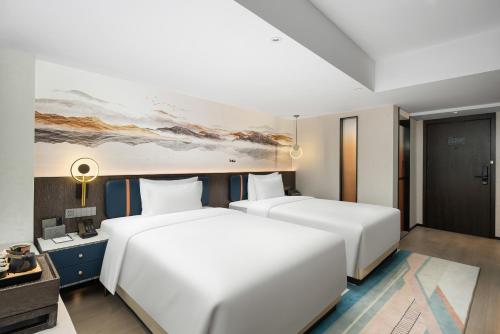 Imagen general del Hotel Mehood Lestie Maoming High-speed Railway. Foto 11