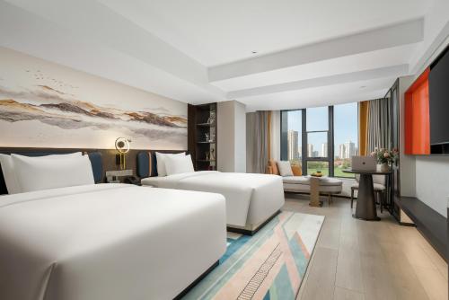 Imagen general del Hotel Mehood Lestie Maoming High-speed Railway. Foto 13