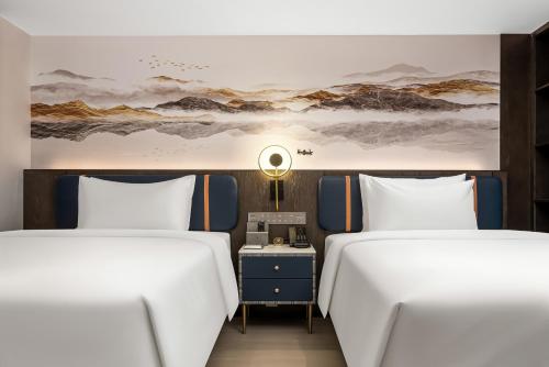 Imagen general del Hotel Mehood Lestie Maoming High-speed Railway. Foto 14