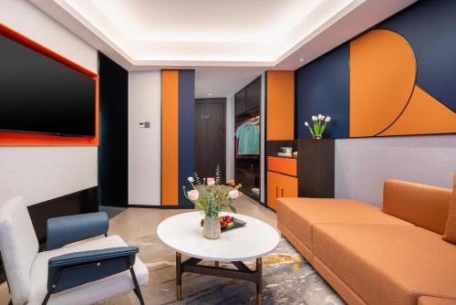 Imagen de la habitación del Hotel Mehood Lestie Maoming High-speed Railway. Foto 20
