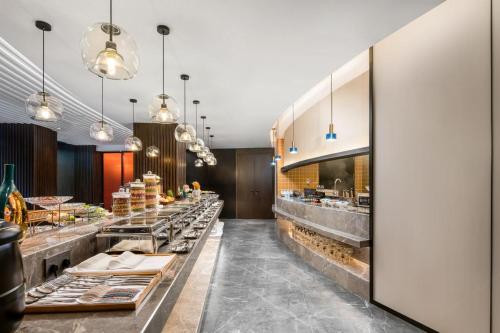 Imagen general del Hotel Mehood Lestie, Maoming High-speed Railway Station. Foto 3