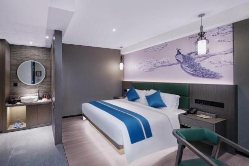 Imagen de la habitación del Hotel Mehood Lestie, Nanjing Jiangbei New Area University of Technology. Foto 12