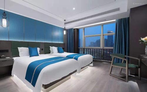 Imagen de la habitación del Hotel Mehood Lestie, Nanjing Jiangbei New Area University of Technology. Foto 16