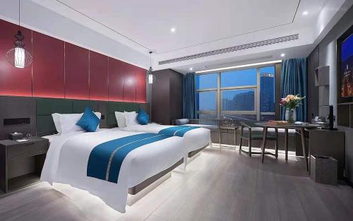 Imagen de la habitación del Hotel Mehood Lestie, Nanjing Jiangbei New Area University of Technology. Foto 17