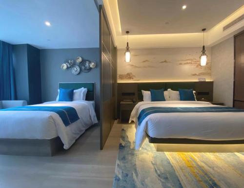 Imagen de la habitación del Hotel Mehood Lestie, Nanjing Jiangbei New Area University of Technology. Foto 20