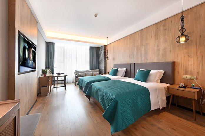 Imagen de la habitación del Hotel Mehood Lestie Panyu Branch. Foto 3