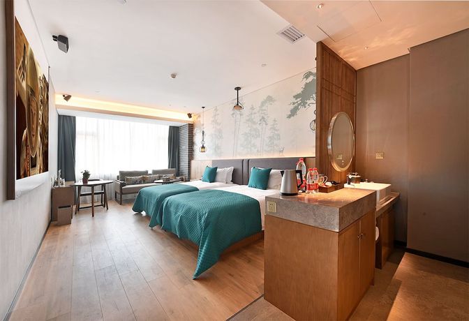 Imagen de la habitación del Hotel Mehood Lestie Panyu Branch. Foto 4