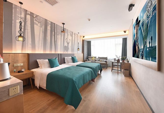 Imagen de la habitación del Hotel Mehood Lestie Panyu Branch. Foto 11