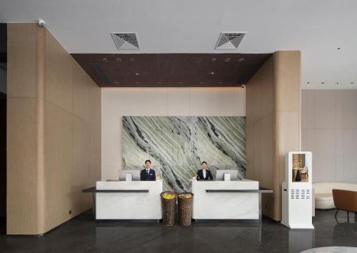 Imagen general del Hotel Mehood Lestie Panyu Wanbo Yuangang Metro Station Branch - Free Shuttle Bus to Canton Fair Comp. Foto 2
