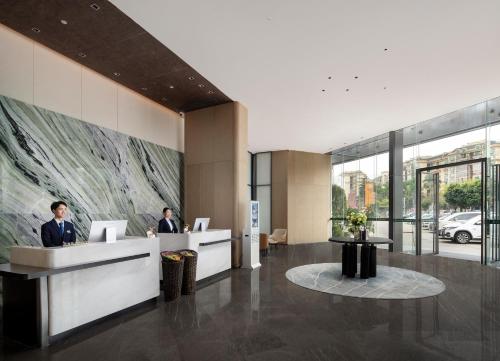 Imagen general del Hotel Mehood Lestie Panyu Wanbo Yuangang Metro Station Branch - Free Shuttle Bus to Canton Fair Comp. Foto 4